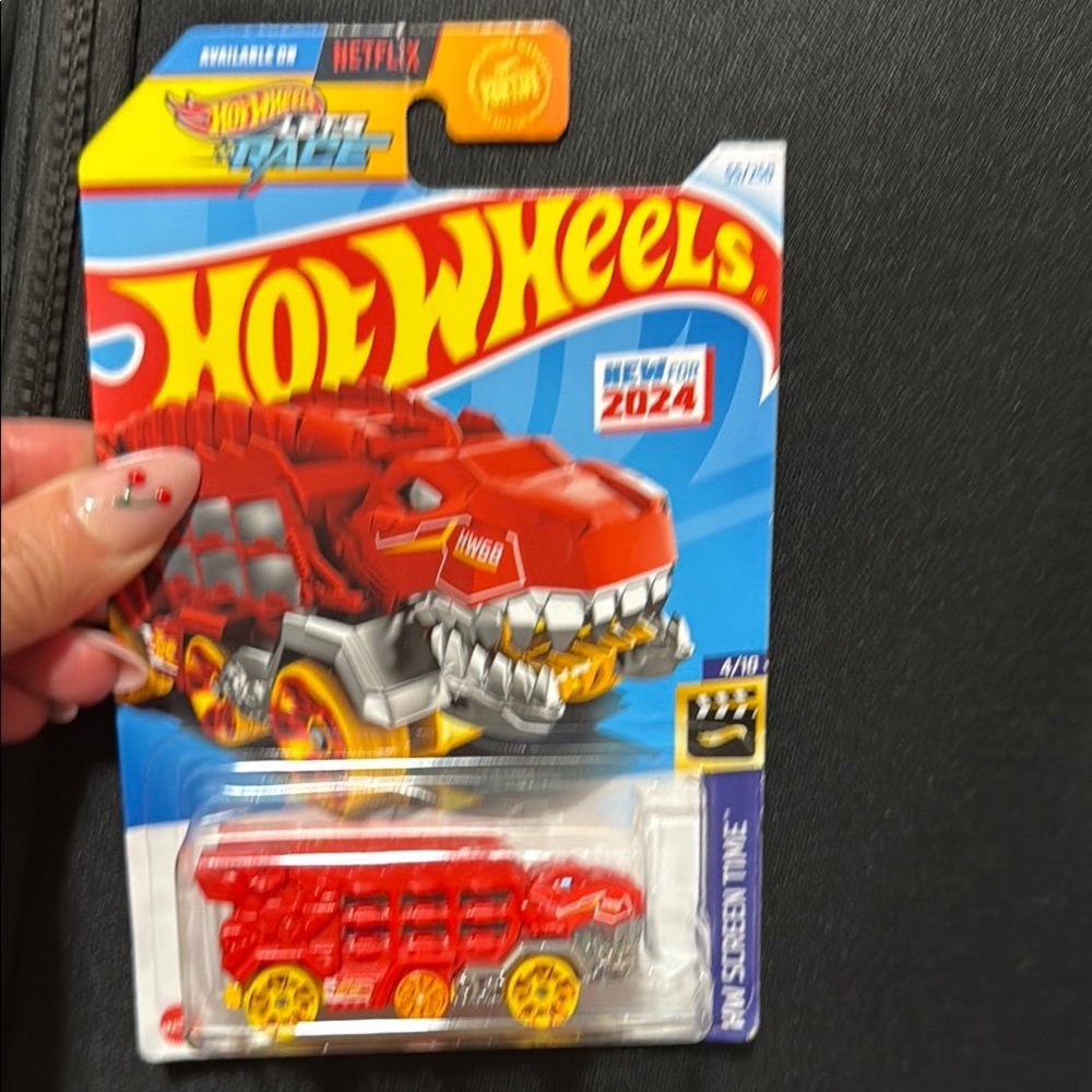 Red and Yellow Dinosaur-Inspired Toy Car